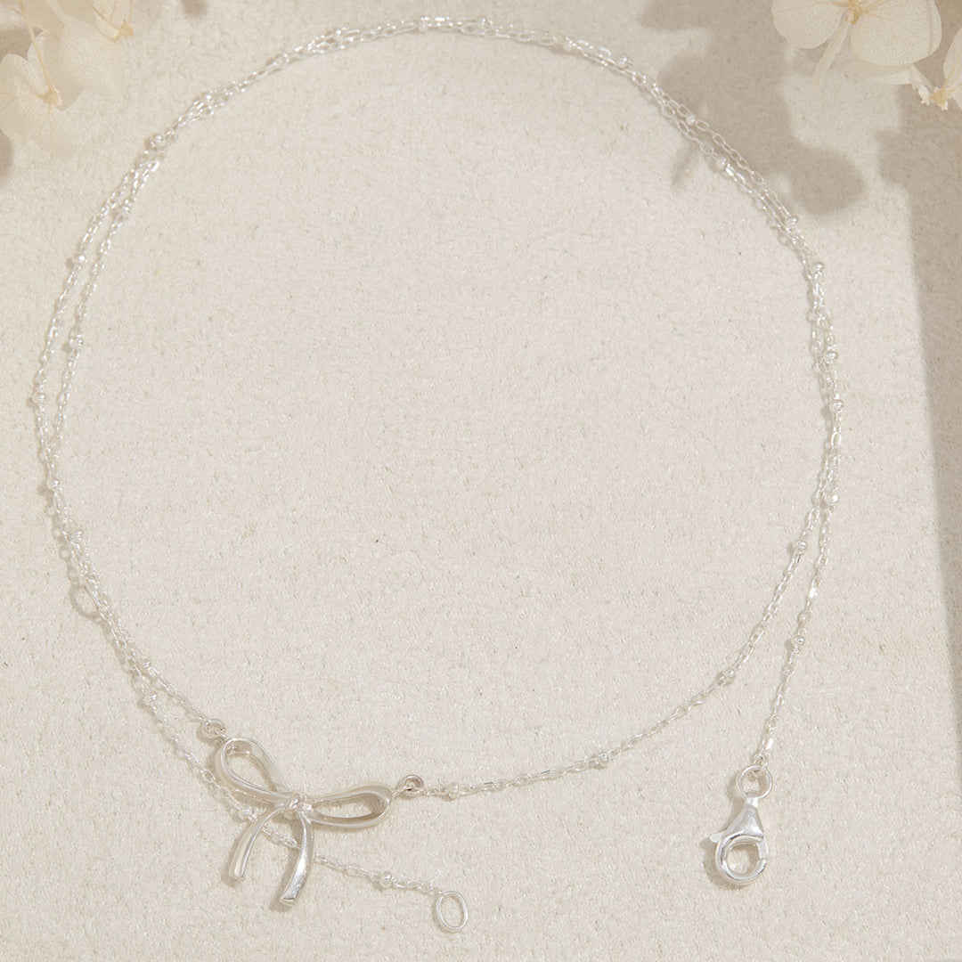 Disco Bow Necklace