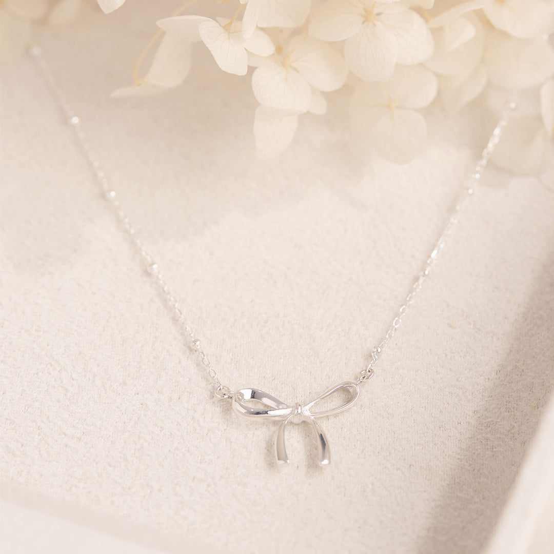 Disco Bow Necklace