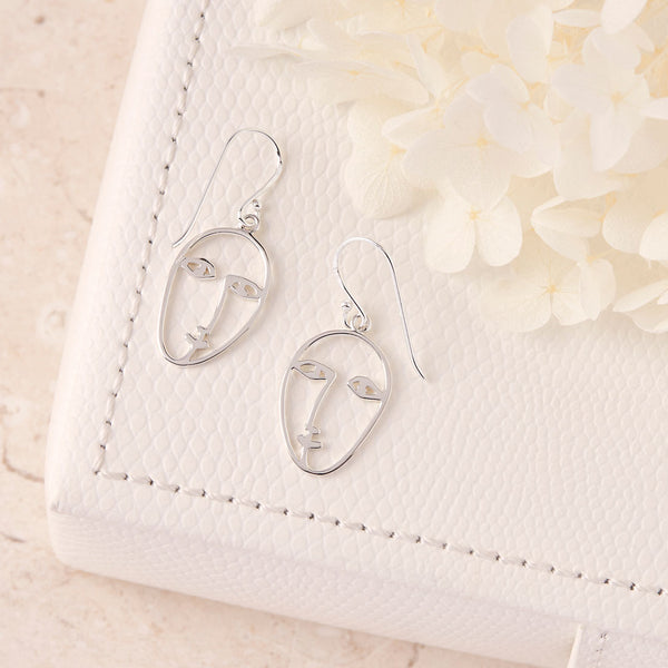 H&m face shaped earrings best sale